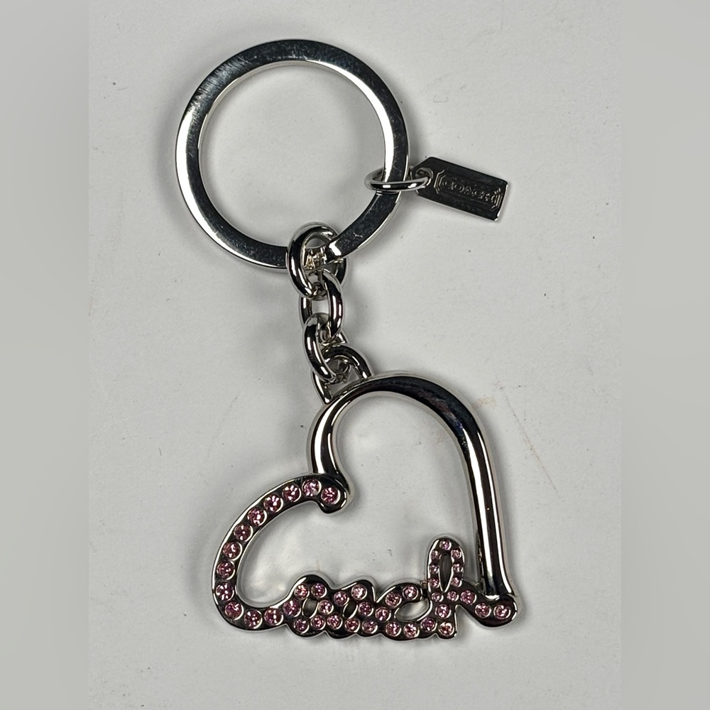 Coach Silver Keychain with Pink Crystal Accents. Hang tags
